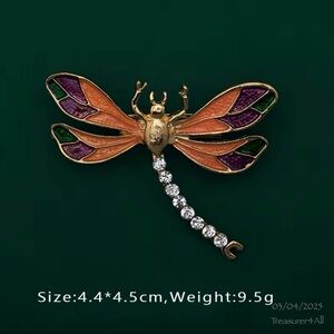 Colorful Dragonfly Brooch with Enamel and Rhinestone Accents Description: This v